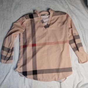 A long sleeve plad shirt